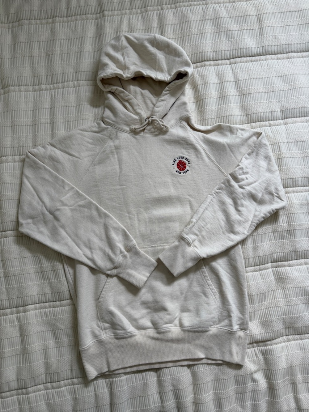 Aime Leon Dore Cream Hoodie with Red Chest Emblem